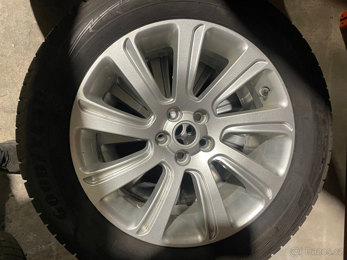 235/60R18 - 6