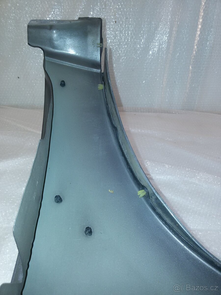 Mazda Tribute: Blatník pravý - 6