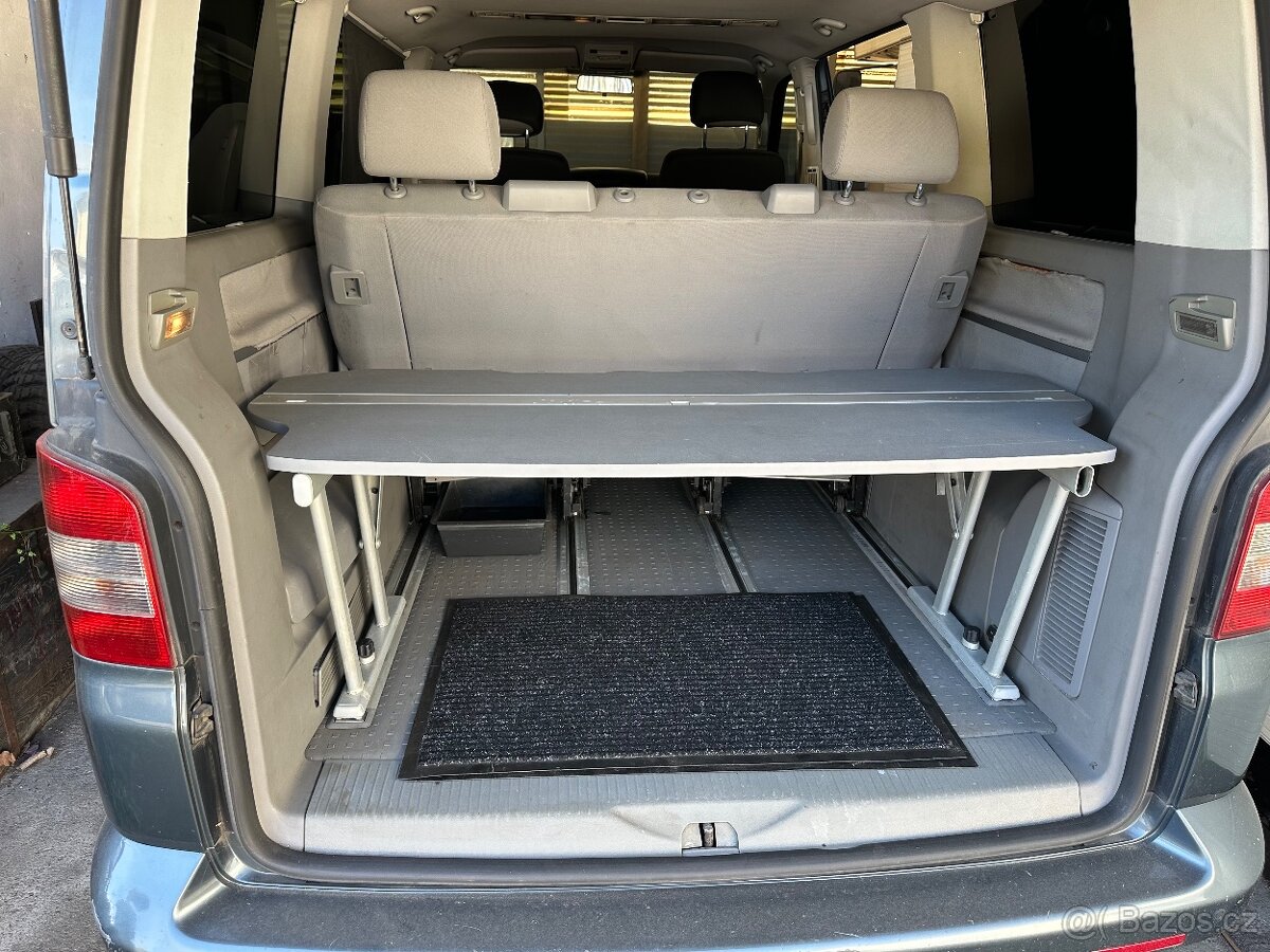 VW Multivan 4x2, 2,5 TD 96 kw,spací lavice,7 míst,tope - 6