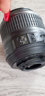 Nikon DX SWM VR Aspherical 28m/0.92ft průměr 52 - 6