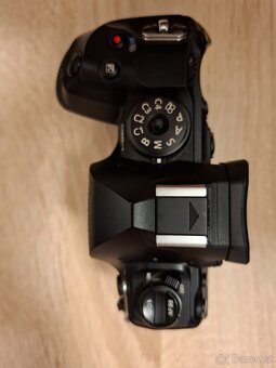 Olympus / System OM-1 + - 6