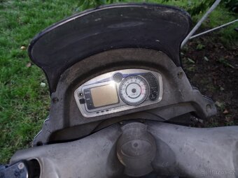 Kymco dink Yager 125 - 6