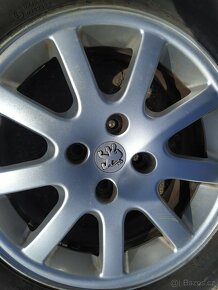 Sada letnich kol Peugeot, disky originál, nepoškozené 6,5 J - 6