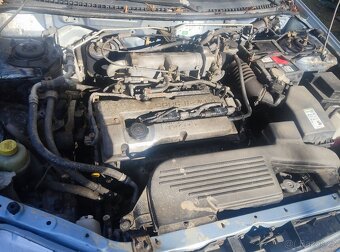 Mazda 323 F , 1,5 - 6