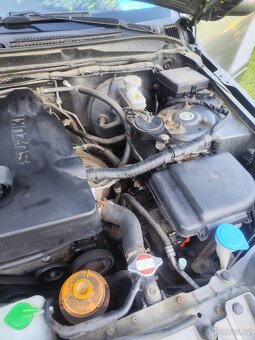 Suzuki grand Vitara 2l. Benzín 103kw 2006 - 6