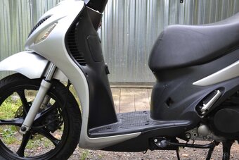 Suzuki Sixteen 150i - 6