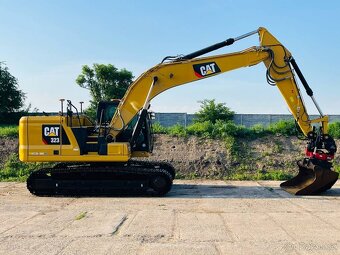Pásový bagr Caterpillar 323 - 6