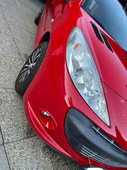 Peugeot 206+ 1,4i MT5, r. 2010 - 6