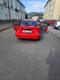 Hyundai acent 1.4 rok 2004 - 6