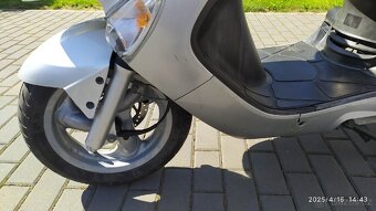 Kymco Grand Dink 125 - 6