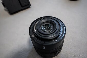 Prodám Nikon Z50 + 2 objektivy (16-50mm a 12-28mm) + přísluš - 6