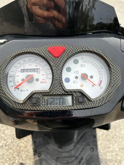 Skůtr 125 - 6