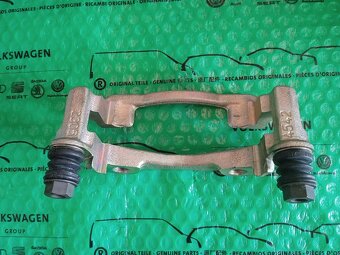 držák třmenu brzdy M12 Škoda Felicia Pick-Up 6U0615125A - 6