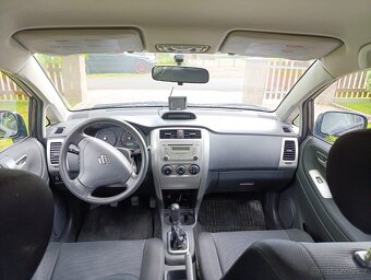 Prodám Suzuki Liana 1,6i , 4x4 , dovoz - 6