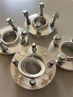 PODLOŽKY: (4x100) šířka 15 a 20mm s náběhem st. kol 59,1mm - 6
