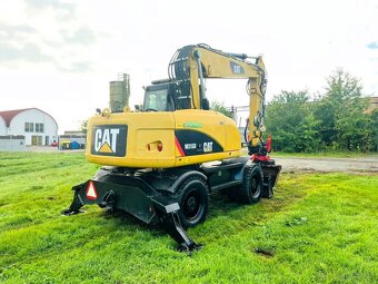Kolové rypadlo Caterpillar M315D - 6