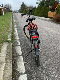 Trekingové kolo Kellys s odpruženou vidlicí SR Suntour a V-b - 6
