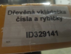 Dřevěný panel s čísly. - 6
