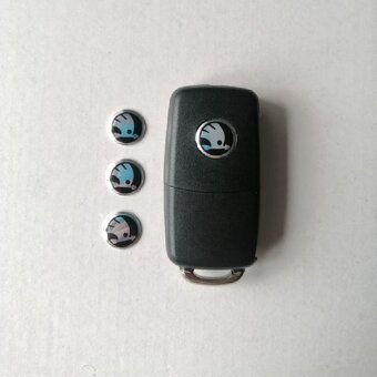 Znaky Škoda 90 a 80mm + znak na volant + středové pokličky - 6
