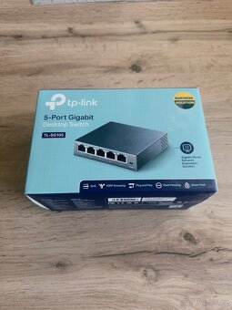 MikroTik RB2011UiAS-2HnD-IN + Tp-link TLCG 105 - 6