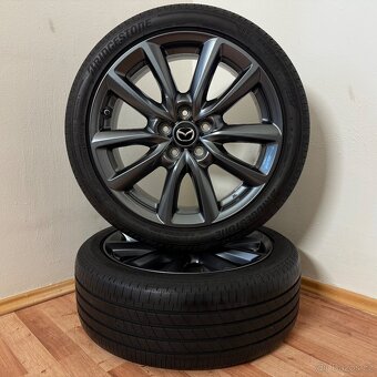 MAZDA 3 5x114,3 R18 ET45+LETNÍ 215/45R18 7,5mm - 6