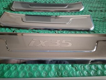 dekorativní ozdobné a ochranné lišty prahu Hyundai ix35 2S45 - 6