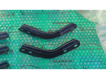 pravý držák přední masky Škoda Felicia 1998- 6U0823574 - 6