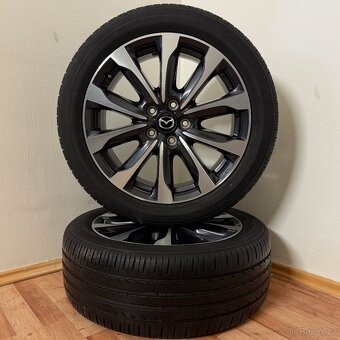 MAZDA CX-3 5x114,3 R18 ET50+LETNÍ 215/50R18 6,5mm - 6