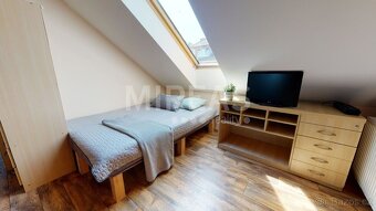 Milovice, prodej podkrovního bytu 3+kk v OV 88,5m2 okres Nym - 6