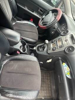 Kia carens - 6