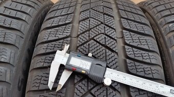 Zimní pneumatiky PIRELLI 245/45 R19 102V XL 4x7,5mm r.2023 - 6