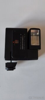 Elektronický blesk Sunpak MX 124 - 6