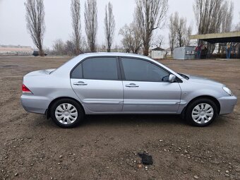 Mitsubishi Lancer, 1.6 - 6