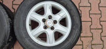 Alu kola Hyundai Tucson 5x114,3 6,5x16 ET41 235/60r16 letní - 6