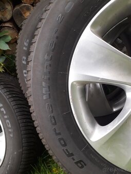 215/60R16 99H + originalni ALU Škoda 7x16 5x112 ET45 - 6