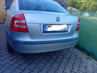 Prodám komplet zadní páté dveře ,vrata na škoda Octavia 2, s - 6