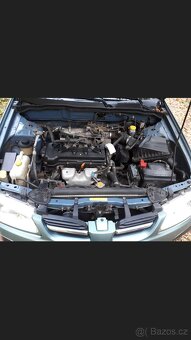 Nissan Almera 1.5 i - 6