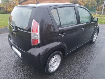 Daihatsu Sirion 4x4 1.3 16V, 64kW, 8/2006, klima - 6