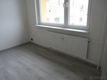 Pronájem kompletně zrekonstruovaného bytu 2+1 Spartakiádní 1 - 6