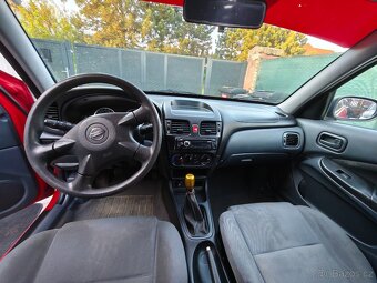 Nissan Almera 1.5 72 kw - 6