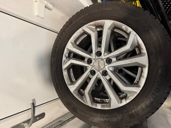 Kompletní sada zimních kol Goodyear + Disky Dezent - 6