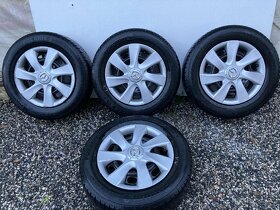 Plechové disky + zimní pneu Barum 195 / 65 R18 4,5 mm - 6