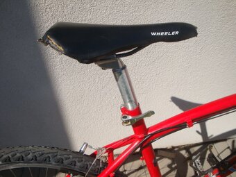 Staré horské kolo Wheeler - shimano Deore LX - 6