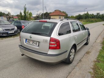 Škoda Octavia Kombi 1.6i - 75 kW + sada kol - 6