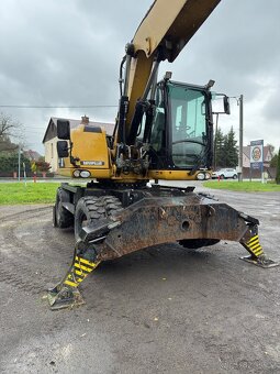 Kolový rypadlo Caterpillar M316D - 6