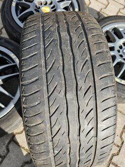 OZ Racing F1 - 5x112/5x100 letní 195/50/15 - 6