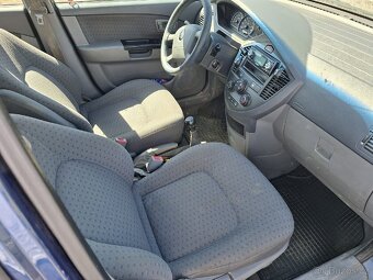 Kia Carens-2.0i - 6