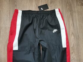 Nové šusťákové kalhoty s podšívkou Nike vel. L - 6