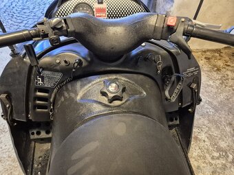 sněžný skútr se stopařem - 6