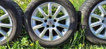 Alu kola Opel Astra H 5x110 6,5x16 ET37 205/55r16 letní 125 - 6